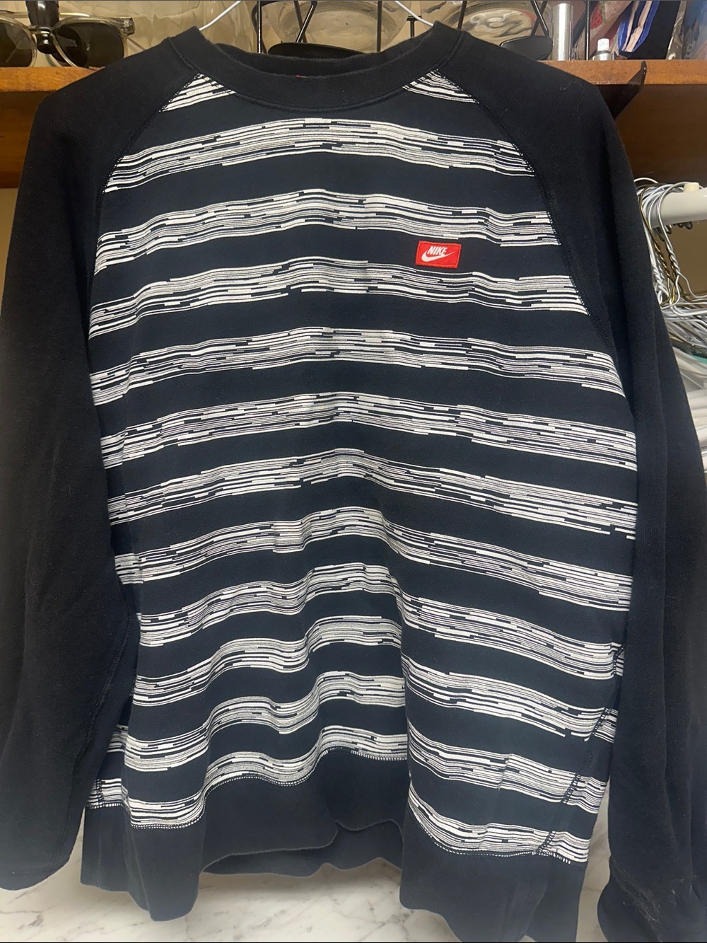 Nike Black Crewneck Sweatshirt with White Stripes and Red Logo